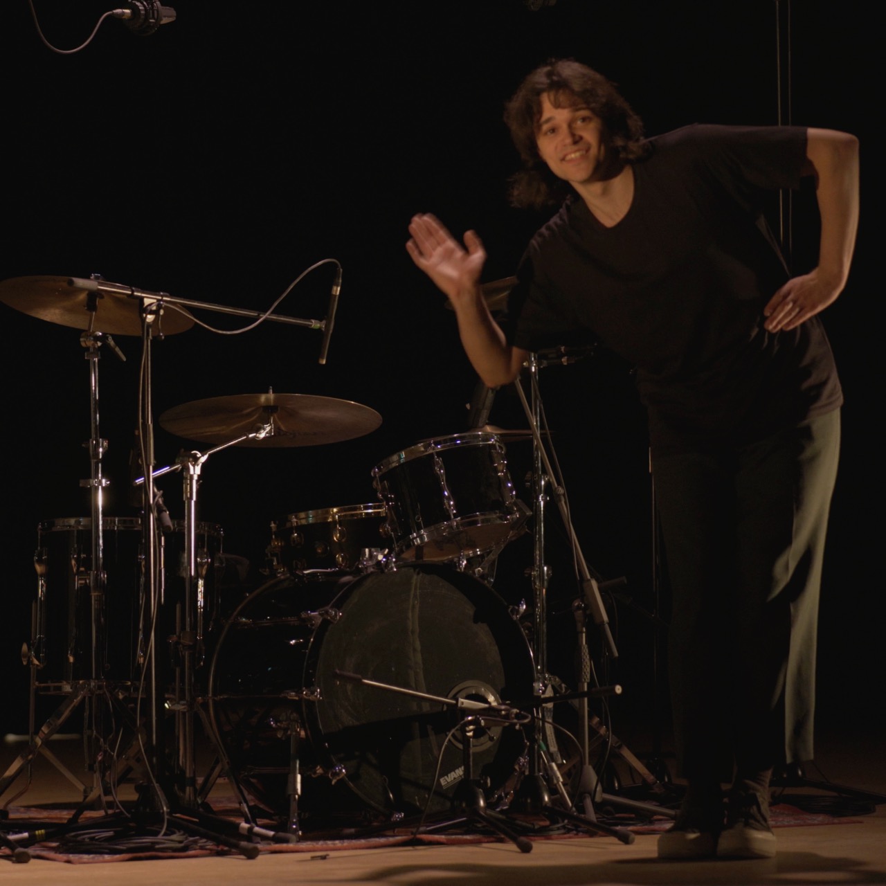 Setting up drums for recording in Phipps Hall